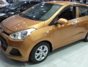 Hyundai Grand i10 1.0 MT Base 2014 - Cần bán xe Hyundai Grand i10 1.0 MT Base đời 2014, màu vàng, nhập khẩu chính chủ