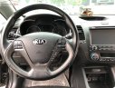 Kia K3 2014 - Bán Kia K3 1.6 MT năm sản xuất 2014, màu đen số tự động