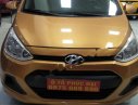 Hyundai Grand i10 1.0 MT Base 2014 - Cần bán xe Hyundai Grand i10 1.0 MT Base đời 2014, màu vàng, nhập khẩu chính chủ