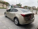 Mazda 3 2016 - Cần bán gấp Mazda 3 1.5 AT sản xuất năm 2016, màu vàng giá cạnh tranh