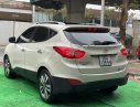 Hyundai Tucson 2.0 AT 2014 - Cần bán lại xe Hyundai Tucson 2.0 AT năm sản xuất 2014, màu kem (be), nhập khẩu số tự động