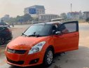 Suzuki Swift 2015 - Bán Suzuki Swift đời 2015, màu nâu, 384tr