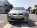 Mitsubishi Grandis 2.4 AT 2009 - Cần bán gấp Mitsubishi Grandis 2.4 AT đời 2009, màu vàng số tự động, giá tốt