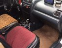 Mazda 323    MT 1999 - Bán ô tô Mazda 323 MT đời 1999, màu trắng, giá 75tr