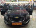 Chevrolet Cruze LT 1.6 MT 2016 - Cần bán Chevrolet Cruze LT 1.6 MT đời 2016, màu đen chính chủ, 395tr
