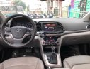 Hyundai Elantra 1.6AT 2016 - Bán Hyundai Elantra 1.6AT sản xuất năm 2016, màu trắng số tự động, 535tr