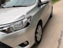 Toyota Vios 1.5E MT 2014 - Bán Toyota Vios 1.5E MT sản xuất 2014, màu bạc xe gia đình
