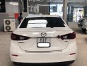 Mazda 3 1.5 AT 2016 - Cần bán Mazda 3 1.5 AT năm 2016, màu trắng số tự động, giá 556tr