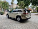 Toyota Highlander LE 2.7 2015 - Cần bán xe Toyota Highlander LE 2.7 năm 2015, màu vàng, nhập khẩu