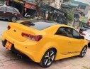 Kia Cerato Koup  2010 - Cần bán gấp Kia Cerato Koup đời 2010, màu vàng, xe nhập