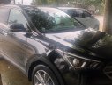 Hyundai Santa Fe 2.2L 4WD 2016 - Cần bán lại xe Hyundai Santa Fe 2.2L 4WD đời 2016, màu đen, giá tốt