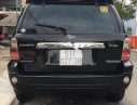 Ford Escape 2.3 AT 2005 - Bán Ford Escape 2.3 AT năm 2005, màu đen xe gia đình