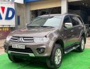 Mitsubishi Pajero Sport G 4x4 AT 2015 - Cần bán gấp Mitsubishi Pajero Sport G 4x4 AT sản xuất năm 2015, màu nâu chính chủ