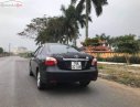 Toyota Vios E 2009 - Cần bán xe Toyota Vios E năm 2009, màu đen