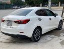 Mazda 2 1.5at 2015 - Bán Mazda 2 1.5at 2015, màu trắng, nhập khẩu nguyên chiếc