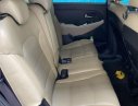 Kia Rondo 2.0GAT 2017 - Cần bán Kia Rondo 2.0GAT 2017, màu vàng xe gia đình