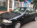 Mazda 323 2001 - Bán xe Mazda 323 đời 2001, màu đen như mới, 69tr