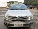 Toyota Innova 2015 - Cần bán Toyota Innova đời 2015, màu bạc số sàn