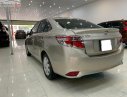 Toyota Vios 1.5E 2014 - Bán Toyota Vios 1.5E sản xuất 2014, màu nâu 