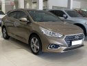 Hyundai Accent   2018 - Cần bán Hyundai Accent 1.4 ATH năm sản xuất 2018, màu nâu, số tự động 