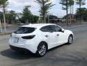 Mazda 3   2015 - Bán Mazda 3 1.5 AT sản xuất 2015, màu trắng, giá chỉ 525 triệu