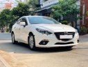 Mazda 3   2015 - Bán ô tô Mazda 3 1.5 AT đời 2015, màu trắng, giá cạnh tranh