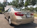 Toyota Camry 2.0E 2013 - Bán ô tô Toyota Camry 2.0E năm 2013, màu vàng, giá chỉ 638 triệu