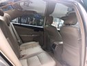 Toyota Camry 2.0E 2013 - Bán ô tô Toyota Camry 2.0E năm 2013, màu vàng, giá chỉ 638 triệu