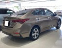 Hyundai Accent   2018 - Cần bán Hyundai Accent 1.4 ATH năm sản xuất 2018, màu nâu, số tự động 