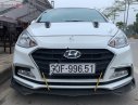 Hyundai Grand i10   2018 - Bán xe Hyundai Grand i10 AT sản xuất năm 2018, màu trắng, chính chủ