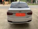 Hyundai Grand i10  1.2 AT  2018 - Cần bán lại xe Hyundai Grand i10 1.2 AT năm 2018, màu trắng số tự động, giá 405tr