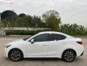 Mazda 2   2016 - Bán Mazda 2 sản xuất 2016, màu trắng giá cạnh tranh