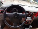 Daewoo Lacetti EX 2011 - Cần bán xe Daewoo Lacetti EX 2011, màu vàng xe gia đình giá cạnh tranh