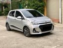 Hyundai Grand i10 1.2AT 2019 - Cần bán gấp Hyundai Grand i10 1.2AT sản xuất năm 2019, màu bạc giá cạnh tranh