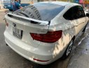 BMW 3 Series 320i GT Sport  2013 - Bán BMW 3 Series 320i GT năm 2013, màu trắng, xe nhập