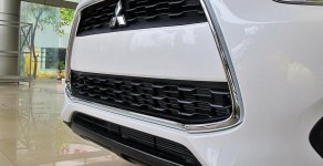 Mitsubishi Outlander Sport GLS 2015 - Bán ô tô Mitsubishi Outlander Sport GLS sản xuất 2015, màu trắng, nhập khẩu chính hãng giá 992 triệu tại Hà Nội