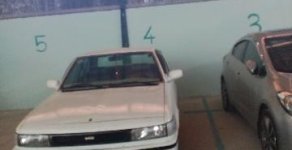 Mitsubishi Lancer   1985 - Cần bán xe Mitsubishi Lancer cũ, màu trắng, nhập khẩu chính hãng xe gia đình giá 52 triệu tại Vĩnh Long