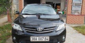 Toyota Corolla 2011 - Cần bán xe Toyota Corolla đời 2011, màu đen đã đi 15000 km, 670 triệu giá 670 triệu tại Hà Tĩnh