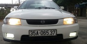 Mazda 323 2000 - Bán ô tô Mazda 323 sản xuất 2000, màu trắng giá 150 triệu tại Quảng Bình
