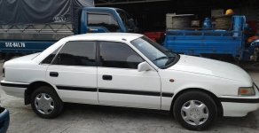 Mazda 323 1989 - Cần bán Mazda 323 đời 1989, màu trắng, giá 58tr giá 58 triệu tại Tp.HCM