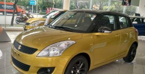 Suzuki Swift 2016 - Cần bán xe Suzuki Swift đời 2016, màu vàng, 609 triệu giá 609 triệu tại Lâm Đồng