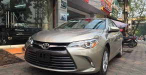 Toyota Camry LE 2015 - Bán Toyota Camry LE đời 2015, màu ghi vàng, nhập khẩu nguyên chiếc giá 1 tỷ 550 tr tại Hà Nội