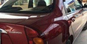 Daewoo Lanos  MT 2003 - Lên đời cần bán xe Daewoo Lanos MT đời 2003, màu đỏ số sàn, giá tốt giá 139 triệu tại An Giang