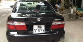 Mazda 626 2000 - Cần bán xe Mazda 626 2000, màu đen, nhập khẩu chính hãng xe gia đình giá 200 triệu tại Hòa Bình