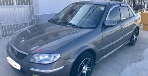 Mazda 323 2003 - Cần bán xe Mazda 323 2003, màu xám (ghi), nhập khẩu nguyên chiếc giá 235 triệu tại Ninh Thuận