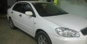 Toyota Corolla altis  MT 2002 - Chính chủ bán Toyota Corolla Altis MT đời 2002, màu trắng giá 295 triệu tại Bình Dương