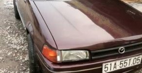 Mazda 323 1988 - Cần bán gấp Mazda 323 sản xuất 1988, màu nâu giá 95 triệu tại Tp.HCM