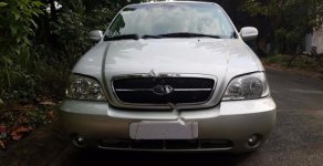 Kia Carnival GS 2006 - Cần bán gấp Kia Carnival GS đời 2006, màu bạc số sàn giá 275 triệu tại Tp.HCM