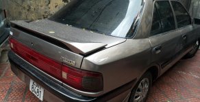 Mazda 323 1992 - Bán xe Mazda 323 đời 1992, màu vàng, nhập khẩu nguyên chiếc, 70 triệu giá 70 triệu tại Hà Nội