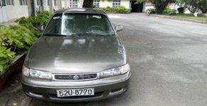 Mazda 626  MT 1998 - Bán Mazda 626 MT sản xuất 1998, màu vàng số sàn giá 168 triệu tại Tp.HCM